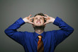 Businessman having headache.
