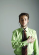 Businessman examining himself.