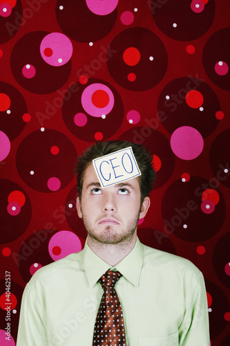 Photo: CEO looking up. CEO looking up.