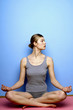 Woman practicing yoga.