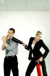 Businesswoman extinguishing her colleague for smoking in the office.