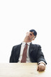 Businessman wearing eye mask sleeping.