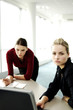 Two businesswomen having discussion.