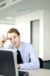 Businessman using laptop.