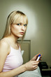 Woman checking her pregnancy test result.