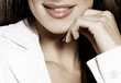 Foto: Businesswoman smiling, close-up Businesswoman smiling, close-up