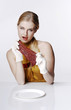 Woman holding a piece of meat.