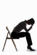Photo: Silhouette of a depressed businesswoman. Silhouette of a depressed businesswoman.