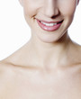 Woman smiling, close-up.
