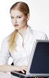 Photo: Businesswoman using laptop. Businesswoman using laptop.
