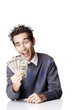 Photo: Man looking at a handful of money. Man looking at a handful of money.