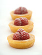 Three raspberry pies.