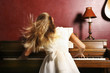 Girl playing piano.