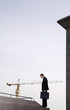 Dejected businessman carrying a briefcase.