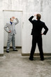 Photo: Businessmen searching for something. Businessmen searching for something.