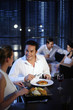 Couple talking while having dinner in a restaurant