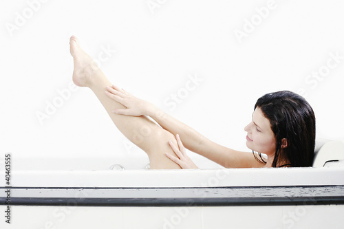 Photo: Woman bathing in the bathtub Woman bathing in the bathtub