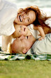 Couple and their lovely daughter having fun in the park