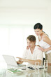 Couple using laptop