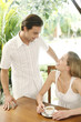 Couple smiling while talking to each other