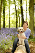 Woman posing with her dog