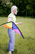 Woman holding a kite