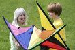 Mother and son holding kites