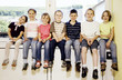 Boys and girls smiling at the camera