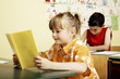 Girl reading in the classroom