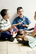Children playing with musical instrument