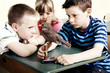 Children looking at a model bird