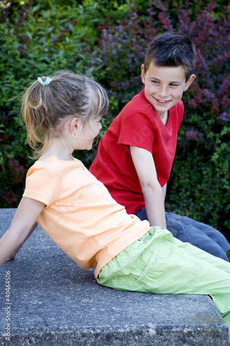 Photo: Boy and girl chatting Boy and girl chatting