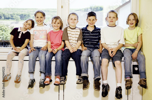 Photo: Boys and girls smiling at the camera Boys and girls smiling at the camera