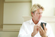 Businessman using a handheld device