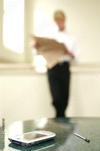 Photo: Businessman reading the newspaper Businessman reading the newspaper