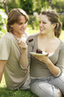 Couple indulging in a piece of chocolate cake