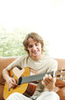 Young man playing the guitar