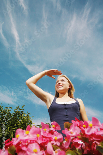 Photo: Young woman looking out Young woman looking out