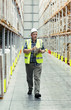 Photo: Man checking warehouse goods Man checking warehouse goods