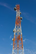 Telecommunications tower under a blue sky. Telecommunications tower under a blue sky.