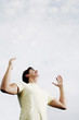Man smiling while looking up