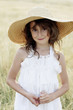 Girl in straw hat