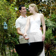 Couple grilling food in the park