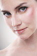 Close-up of a woman's face with make-up