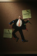 Businessman being pinned up on the notice board