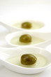 Olives in three spoons.