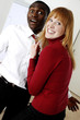 Photo: Businesswoman threatening her male colleague Businesswoman threatening her male colleague