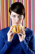 Woman holding orange
