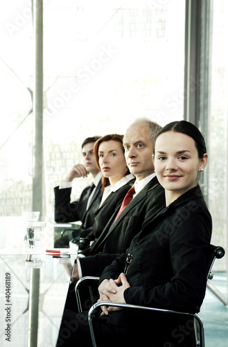 Photo: Business people sitting in the conference room Business people sitting in the conference room