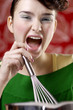 Woman screaming while cooking